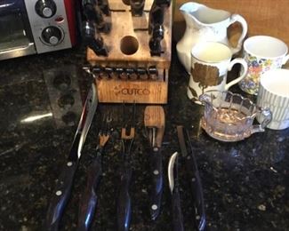 Cut costs knife set full block with forks for round holes plus all steak knives, check out the price on amazon for this one folks, shocker!