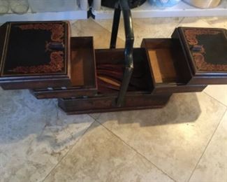 Antique sewing cabinet, legs inside
