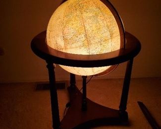 2 Way lighted globe on wooden stand and rollers