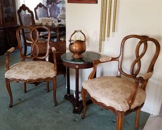 Matching Pair of Hand Carved Pretzel Back Chairs, Old Coiled Springs, newer upholstery, antique Copper and Delph bucket, Marble top tricorn occasional table 