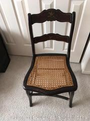Wicker-seated wooden chair