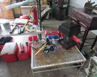 Metal Table, Wood Chest, Cooler, Gas Cans, Hammers