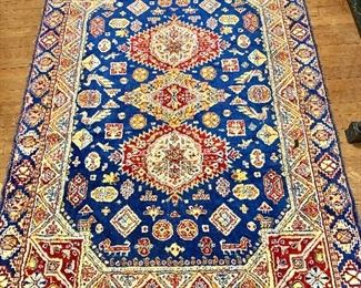 Silk rug 67 inches by 48 inches $120