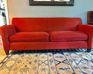Rug in front of couch is sold