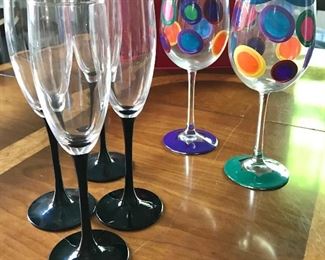 Four champagne flutes $8; Two hand painted glasses $10