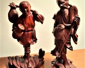 Oriental wood carved figurines