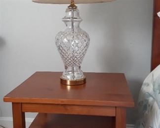 One of a pair of matching nightstands with WATERFORD LAMPS