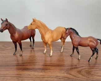 trio of plastic 60s horses