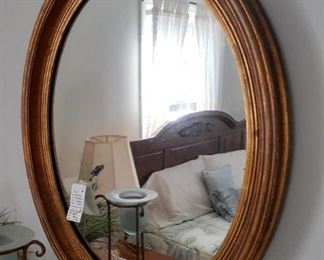 Antique gold framed oval mirror
