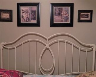 White metal, king-sized head board and wall decor