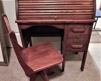 Antique child's rolltop desk and chair
