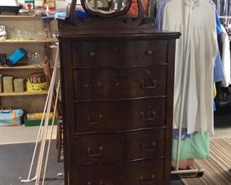Nice vintage tall dresser with mirror.