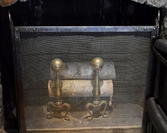 Fireplace screen and brass andirons