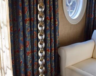 Silver floor lamp and curtains