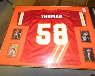 Derrick Thomas Childs Jersey and football cards  framed