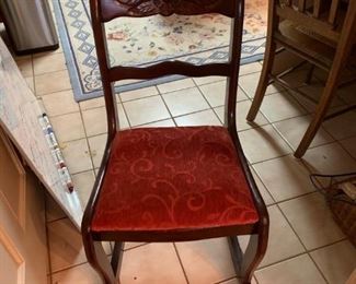 #26 rose carved rocking chair w red velvet seat   $ 40.00