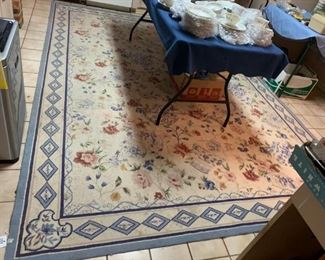 #27 blue cream needle point rug 94x140 as is dirty  $ 65.00