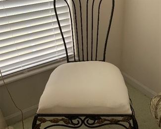 Upholstered wrought iron chair.  Comfortable and cute!