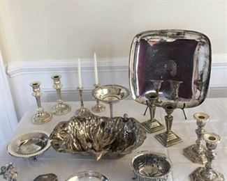 Silver Plate and Silver Colored Serving Dishes and Candleholders https://ctbids.com/#!/description/share/340941