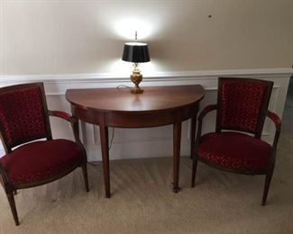 Demi Lune Table with 2 Red Crushed Velvet Upholstery Chairs and Small Lamp. https://ctbids.com/#!/description/share/340961