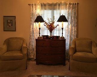 Accent chairs, 5 drawer chest, brass lamps, and home accents. 
