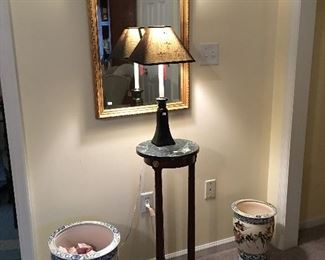 decorative vases, accent table, lamp and gold mirror 