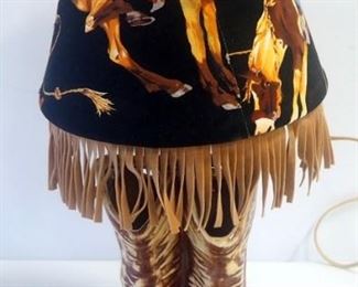 18" Ceramic Lamp With Leaf Design And 15" Cowboy Boot Lamp With Fringed Cloth Shade, Both Power On