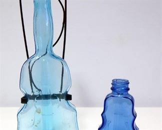 Two Blue Glass Standing String Instruments