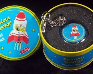 HMCo/ Schilling Curious George Pocket Watch "Curious George Goes To Space", In Collectible Tin