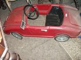 Jaguar pedal car.