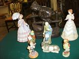 How bout a large, heavy, Bronze Hummel doorstop. Two Lenox ladies, Goebels, Hummels,