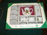 Child's set of dishes made in Germany & it's a shame the kids can't get bigger portions.
