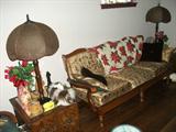 MATCHED PR. LAMPS, RED & WHITE THING IS JUST LAYING ON BACK OF COUCH