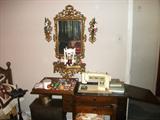 Mirror & sconce Set over her sewing machine (old case w/ newer machine.