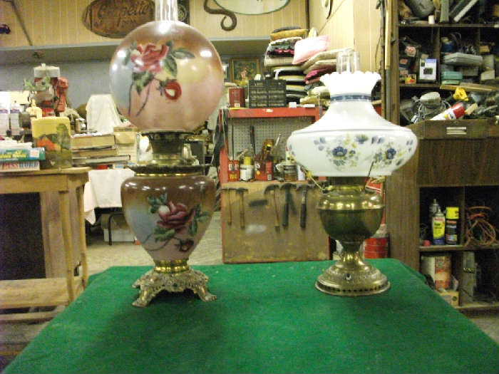 Left lamp: 1890's, coal Oil lamp (all original). Right: Bradley & Hubbard Lamp