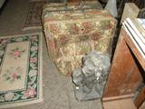 Concrete Lion. Bags to skip town with.