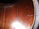 the 2 lines are separations from dried glue, not cracked or broken. Note 1 separation is in the sound bar.