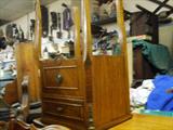 SATINWOOD FRENCH NITE STAND. KIND OF UPSIDE DOWN 'CAUSE WE DIDN'T HAVE PLACE TO SIT IT AT TIME.