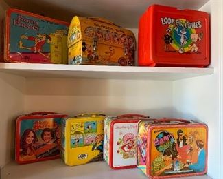 A variety of vintage lunchboxes