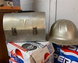 Old lunchpail and hardhat