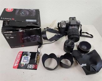 Lumix G DMC-G7K 4K Digital Camera and 3 Lenses
Vivitar HD 0.43X Wide Angle Converter W/ Macro. Lumix 14-42 and 14-140