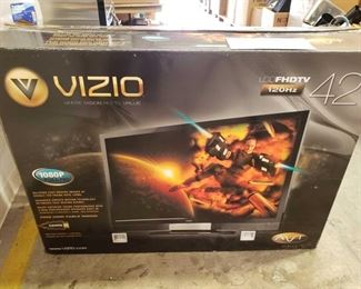 42" Vizio LCD FHDTV with Box and Remote
42" Vizio LCD FHDTV with Box and Remote