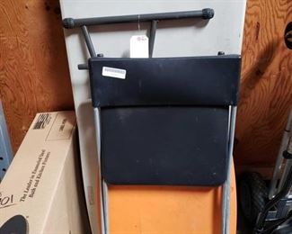 4 Folding Tables and 1 Chair
Table tops measure approximately 26" x 19" to 24" x 48"