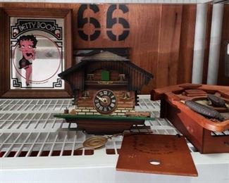 2 Cuckoo Clocks, 1 Betty Boop Mirror
2 Cuckoo Clocks, 1 Betty Boop Mirror