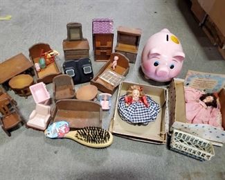 Vintage Dolls, Doll Furniture and More
1 13" Box of Toys Includes a Piggy Bank, and Doll Set Accessories