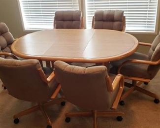 Wood Oval Table ~ 65 in. x 42 in. w/18 in. leaf and 6 Taupe Microfiber Rolling Chairs