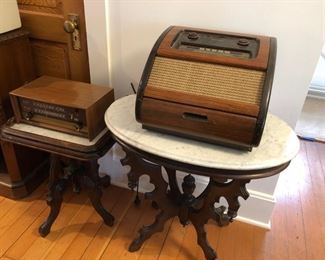 Altek radio on left and Phillips radio/record player on two marble top side tables. 