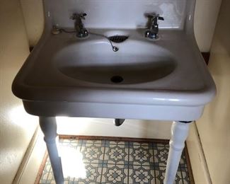 Beautiful antique sink with fixtures. Works great!