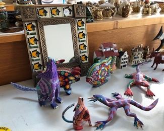 Mexican painted and beaded animals, antique donkey bank, 2 houses from Venice and one from Amsterdam.