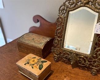 Florentine boxes and antique mirror